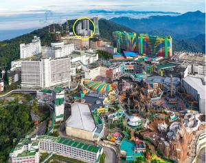 an aerial view of a amusement park with a roller coaster at Genting Hilltop Ion Delemen Homestay in Genting Highlands