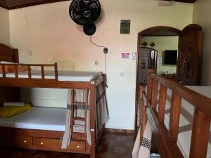 Postel nebo postele na pokoji v ubytování Hostel Roraima