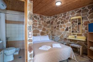 Katil atau katil-katil dalam bilik di Eleni villa