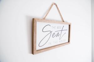 a picture of the best gear in the house in a wood framed sign at Manchester Apartments by BEVOLVE - Free Parking in Manchester