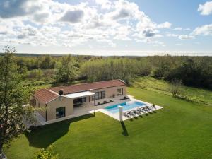 an aerial view of a house with a swimming pool at Villa Vesna - Premium Collection in Sveti Petar u Šumi