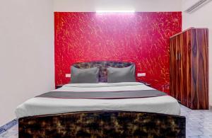 Postel nebo postele na pokoji v ubytování Hotel O One Plus One Residency