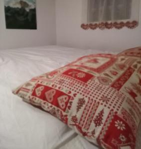 Postel nebo postele na pokoji v ubytování Casa FALCADE DOLOMITI