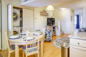 a kitchen and dining room with a table and chairs at Walk to Ocean City Beach Condo with Rooftop Deck in Ocean City