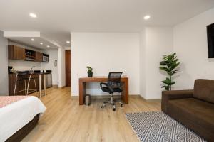 Χώρος καθιστικού στο Leblón Suites Hotel