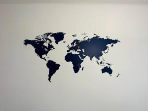 a map of the world on a white background at Warsaw City Center Rooms in Warsaw