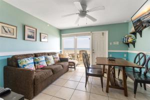 a living room with a couch and a table at 427 E Miami Ave, Unit 509 in Wildwood Crest