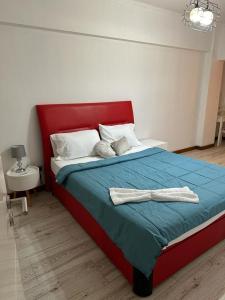 Łóżko lub łóżka w pokoju w obiekcie Lovely house in Luanda Centre with treadmill