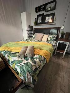Säng eller sängar i ett rum på Kiewiets Creek Guesthouse