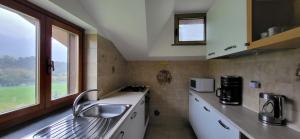 Kuchyň nebo kuchyňský kout v ubytování Casa Estulio