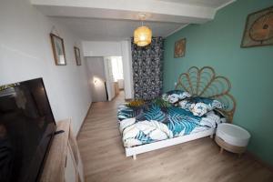 Gîte La Foresienne客房内的一张或多张床位