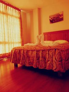 a bedroom with a bed in a room at HOTEL AREQUIPA ANDINOS in Arequipa