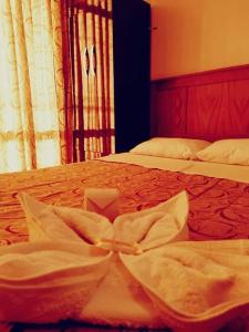 En eller flere senger på et rom på HOTEL AREQUIPA ANDINOS
