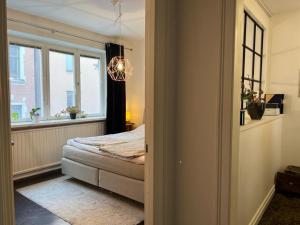 Postel nebo postele na pokoji v ubytování Apartment in the middle of So-Fo, Södermalm, 67sqm