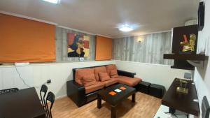Posezení v ubytování The Victoria Apartament in Hellín