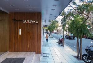 a building with the name square on the side of a street at Estudio VIP en Recoleta in Buenos Aires