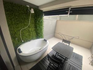 Ένα μπάνιο στο Studio com Spa e Garden Vila Mariana +19 φωτογραφίες