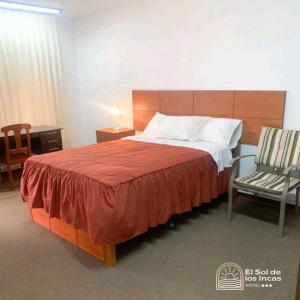 Łóżko lub łóżka w pokoju w obiekcie Hotel el sol de los incas