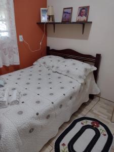 En eller flere senge i et værelse på Chácara pão de açúcar