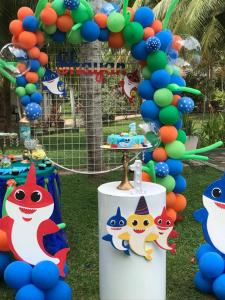 a birthday party with balloons and a table with a cake at Hotel Lagoon Paradise in Negombo