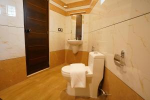Koupelna v ubytování Grand Residency & Resort