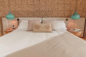 Letto o letti in una camera di The Brown, Guatape, Autograph Collection