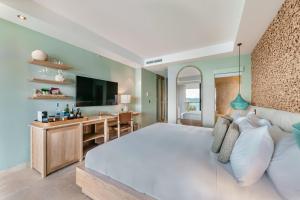 Letto o letti in una camera di The Brown, Guatape, Autograph Collection