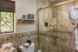 a bathroom with a shower and a toilet at Sheridan House Inn- Adult Only Accommodation in Williams +37 photos