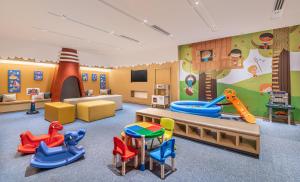 a childrens play room with many different types of play equipment at Seda Manila Bay in Manila