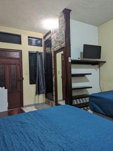 Casa González客房内的一张或多张床位