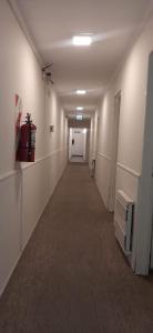 an empty hallway in an office building at Hotel Turis in San Rafael