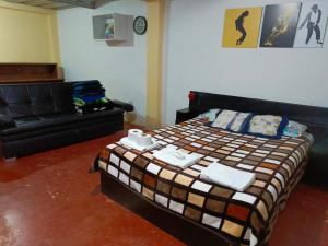 Voodi või voodid majutusasutuse Apartamento semi Urbano toas