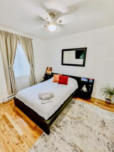 Postel nebo postele na pokoji v ubytování Barel Residence Homestay