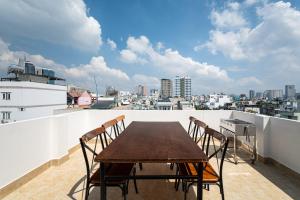 En balkon eller terrasse på Sweet Rentals Homes Ho Chi Minh