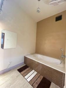 Koupelna v ubytování Tattva Paying guesthouse + 6 fotografií