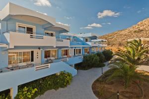 a rendering of a villa with blue at Royal Beach Hotel in Arkasa