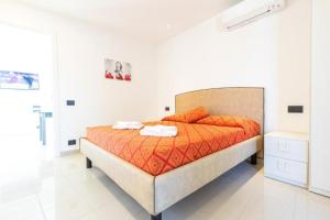 Ένα ή περισσότερα κρεβάτια σε δωμάτιο στο Modern villa close to the beach