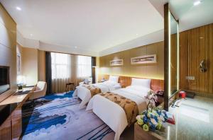 Postel nebo postele na pokoji v ubytování Yinchuan Xifujing Hotel + 37 fotografií