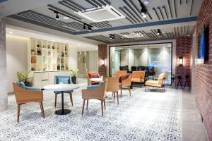 Posezení v ubytování Golden Tulip Lucknow