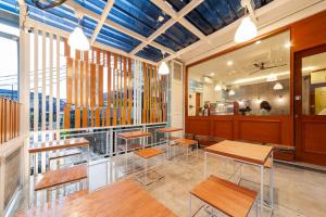 Restaurace v ubytování Sans Hotel Suryakencana Bogor