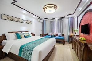 Voodi või voodid majutusasutuse Tongli Lanshe Garden B&B toas