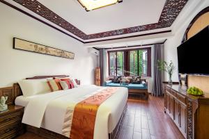 Voodi või voodid majutusasutuse Tongli Lanshe Garden B&B toas