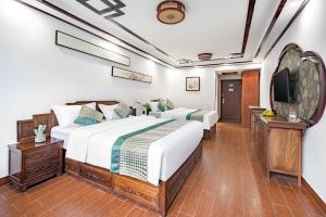 Voodi või voodid majutusasutuse Tongli Lanshe Garden B&B toas