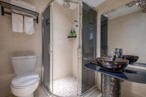 Vannituba majutusasutuses Tongli Lanshe Garden B&B