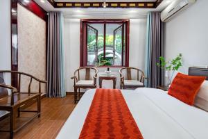 Voodi või voodid majutusasutuse Tongli Lanshe Garden B&B toas