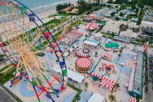 an amusement park with a roller coaster and a carnival at Villa sân vườn Misa in Phan Thiet