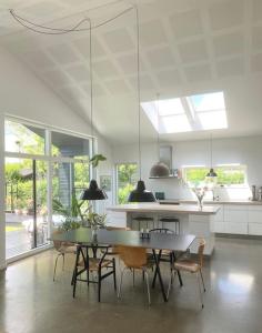 a dining room with a table and chairs in a kitchen at House in beautiful Copenhagen in Copenhagen