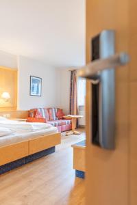 Postel nebo postele na pokoji v ubytování Hotel Central