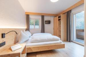 Postel nebo postele na pokoji v ubytování Hotel Central