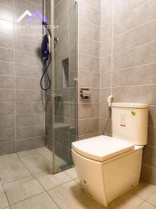 a bathroom with a toilet and a shower at Paragon Residences By Elegant Johor Bahru in Johor Bahru